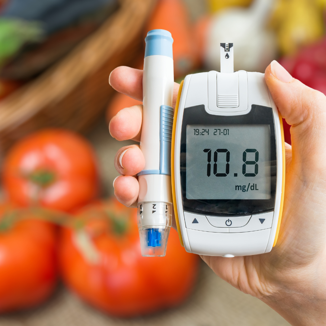 Sugar monitoring device with fruits and vegetables on the background