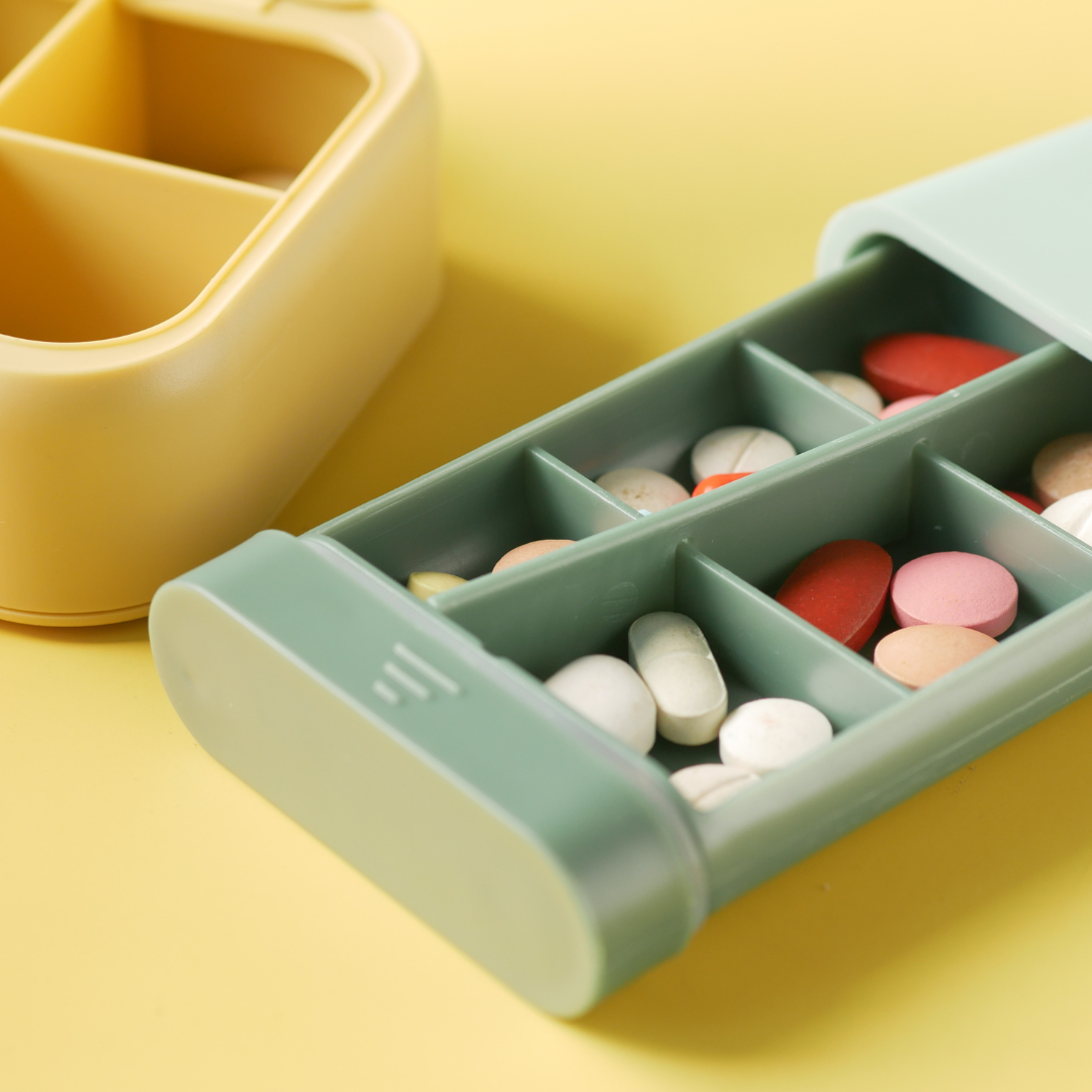 medicines and vitamin in an organizer